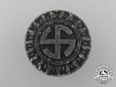 An Unattributed Third Reich Period Sunwheel Swastika Badge By Wilhelm Schröder & Co