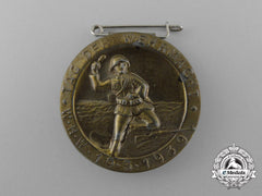 A 1939 Winter Aid Of The German People “Day Of The Wehrmacht” Badge