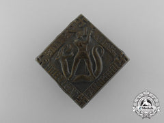 A 1934 Hj Bann B-21 Meeting Badge