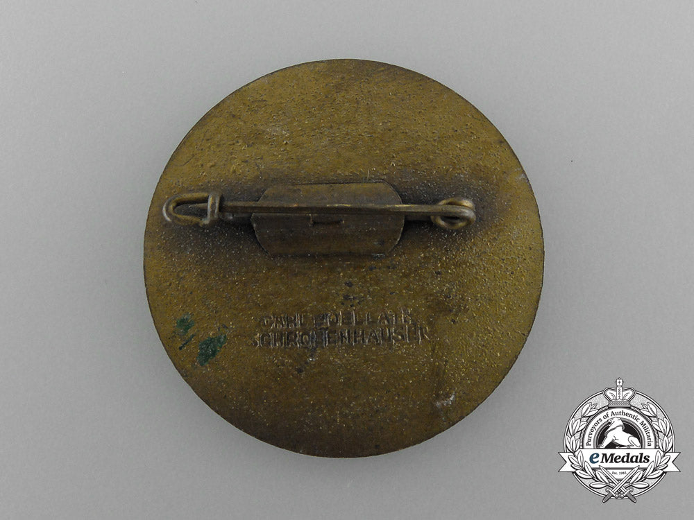 a1936_nsdap_reichs_party_day_badge_by_carl_poellath_d_4348