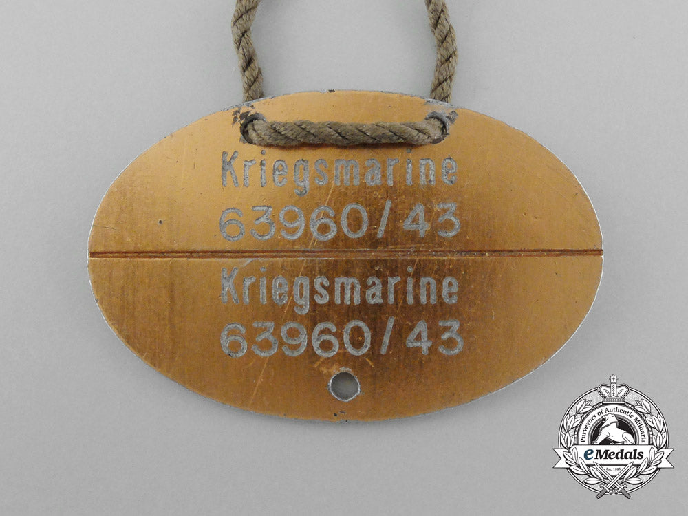 a_scarce_kriegsmarine_identification_tag_on_original_string_necklace_d_4416_1