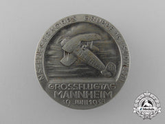 A 1938 National Socialist Flyer’s Corps Group 16 Mannheim “Great Day Of Flight” Badge