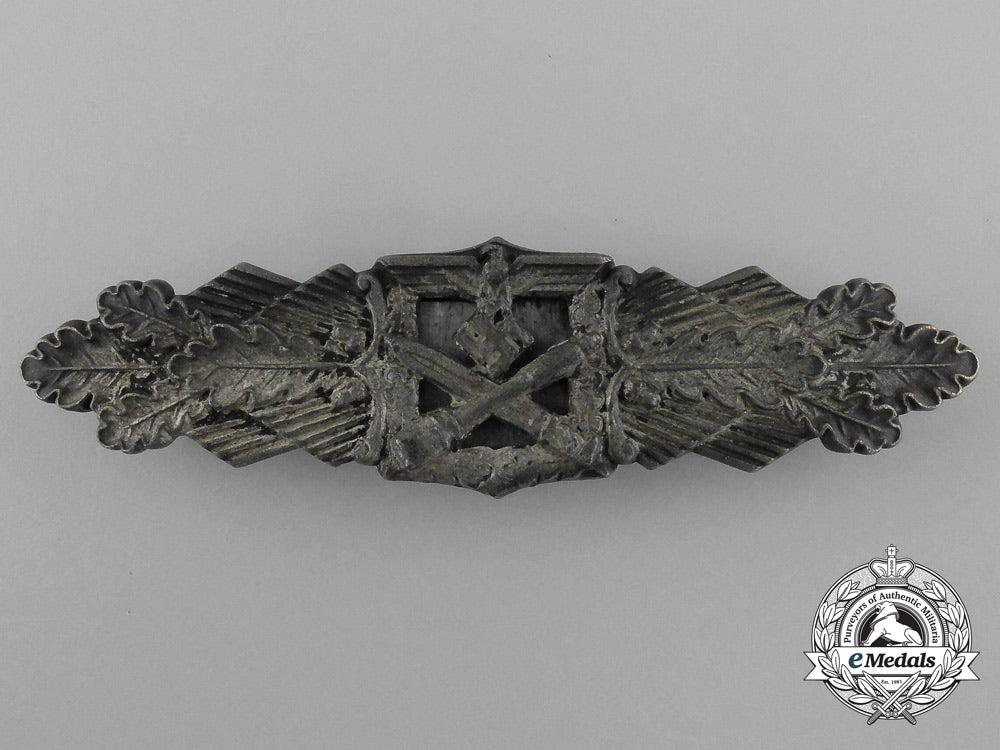 germany,_wehrmacht._a_close_combat_clasp,_silver_grade,_by_c.e_junker_d_4985_1