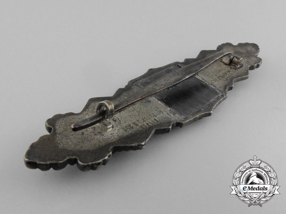 germany,_wehrmacht._a_close_combat_clasp,_silver_grade,_by_c.e_junker_d_4989_1
