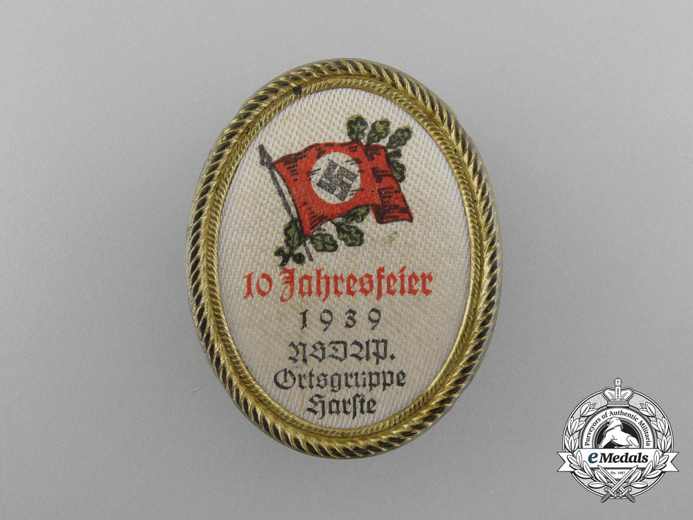 a1939_nsdap_ortsgruppe_karste_community10_year_anniversary_badge_d_5129