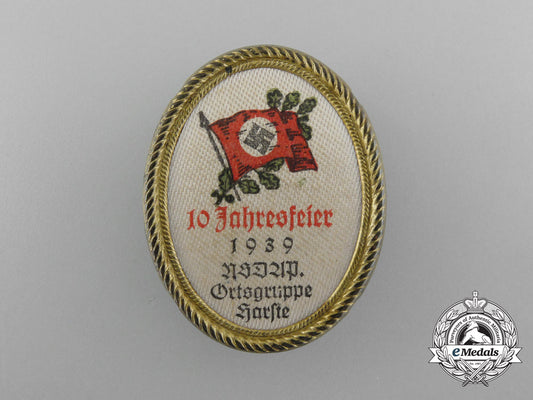 a1939_nsdap_ortsgruppe_karste_community10_year_anniversary_badge_d_5129
