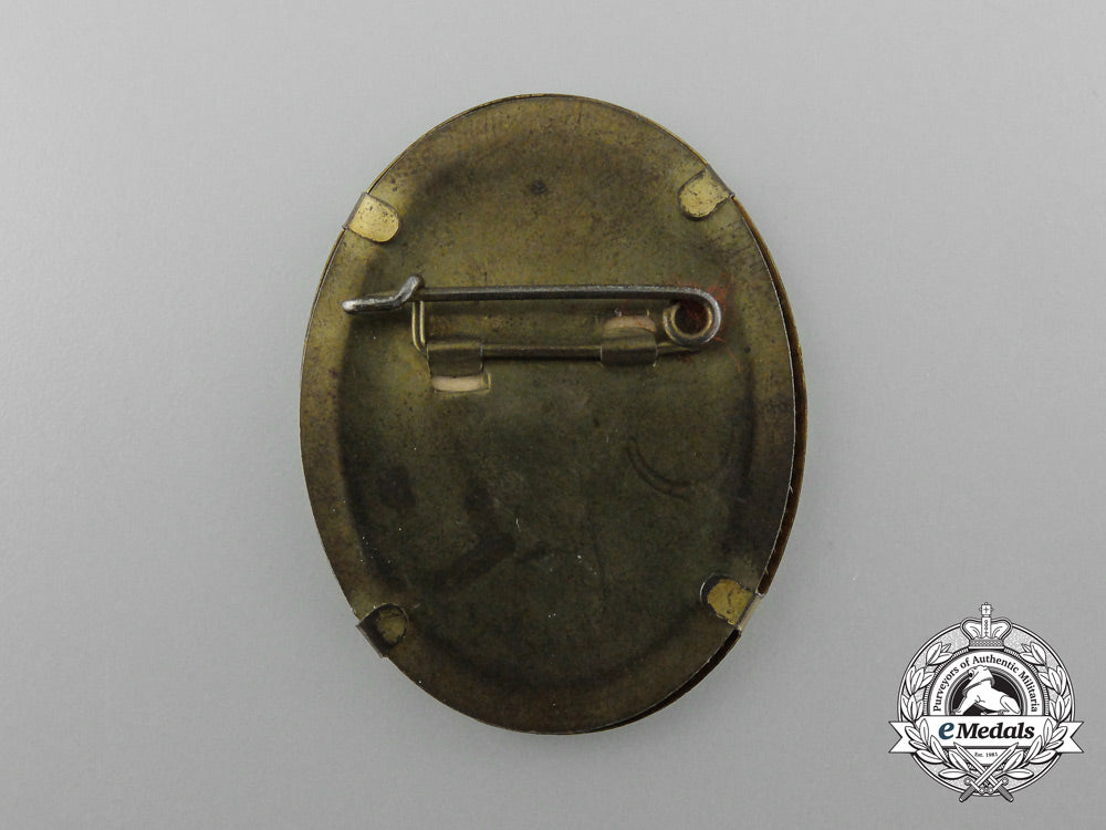 a1939_nsdap_ortsgruppe_karste_community10_year_anniversary_badge_d_5130