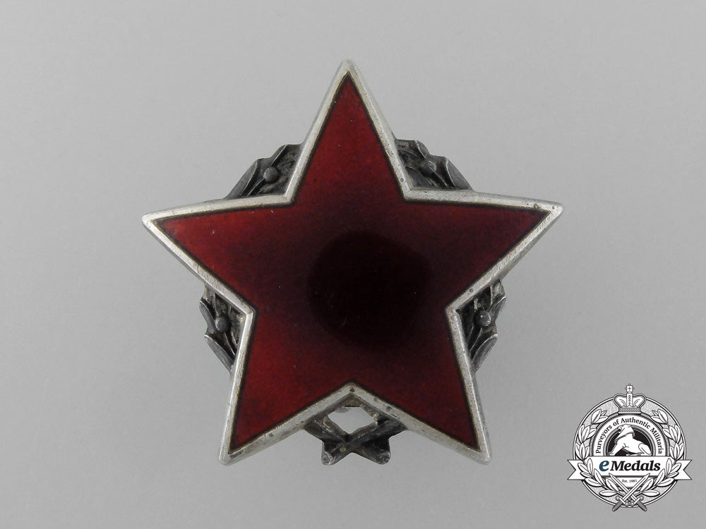 a_socialist_yugoslavian_order_of_the_partisan_star_with_silver_wreath_d_5203_1