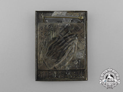 a1936-1937_nsdap_winter_aid10_schilling_donation_badge_d_5262