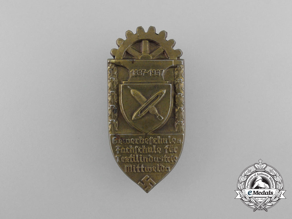 a1937100-_year_anniversary_for_the_vocational_school_and_technical_school_of_the_textile_industry_of_mittweida_badge_d_5287