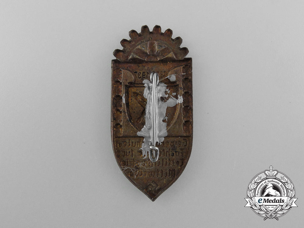 a1937100-_year_anniversary_for_the_vocational_school_and_technical_school_of_the_textile_industry_of_mittweida_badge_d_5288