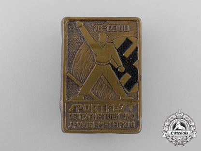 germany,_third_reich._a_gymnastics_and_sportfest_badge_d_5367_1