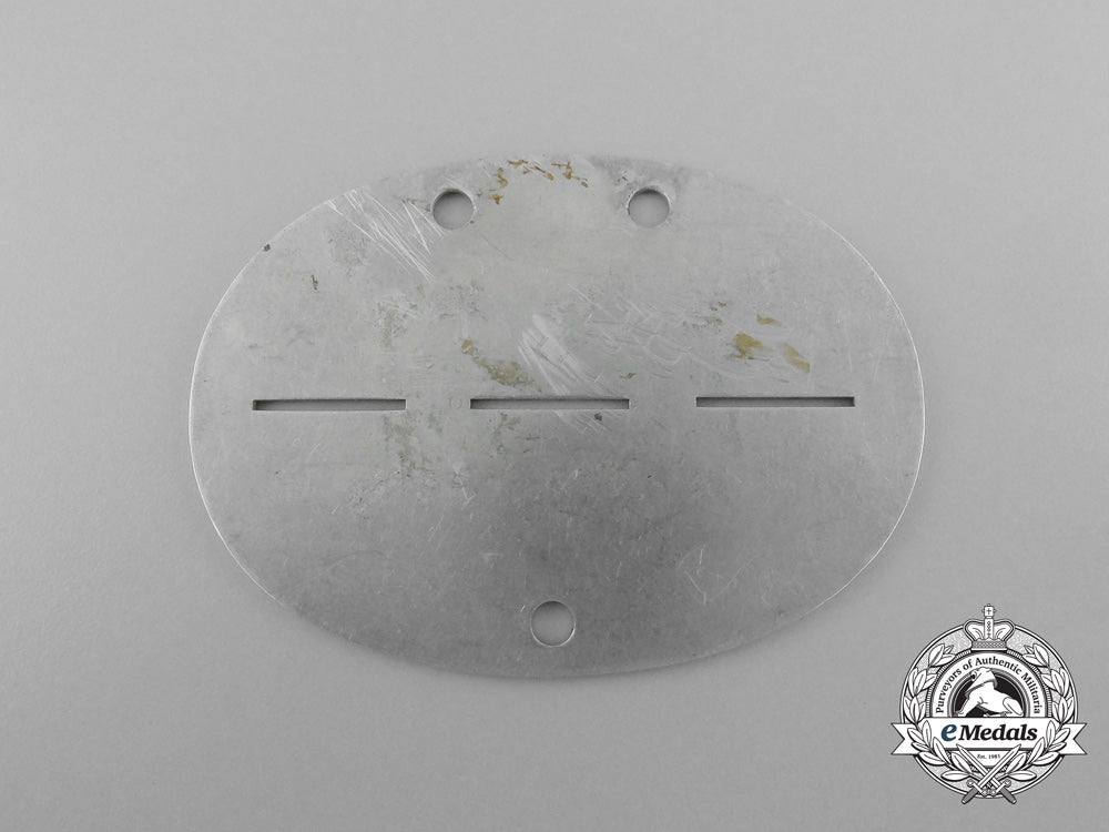 a_third_reich_period_medical_personnel_replacement_battalion3_identification_tag_d_5461