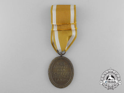 germany._a_west_wall_medal_with_original_packet_of_issue_by_carl_poellath_d_5494_1