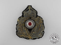 An Imperial German Navy (Kaiserliche Marine) Ensign (Fähnrich) Cap Badge