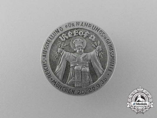 a1935_munich_grocery_and_luxury_foodstuffs_reichs_exhibition_badge_by_willy_annetsberger_d_5557