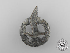 A Scarce Dutch Nationale Jeugdstorm Sports Badge; Girls’ Version; Numbered