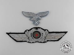 A Luftwaffe Officer’s Visor Cap Wreath And Eagle