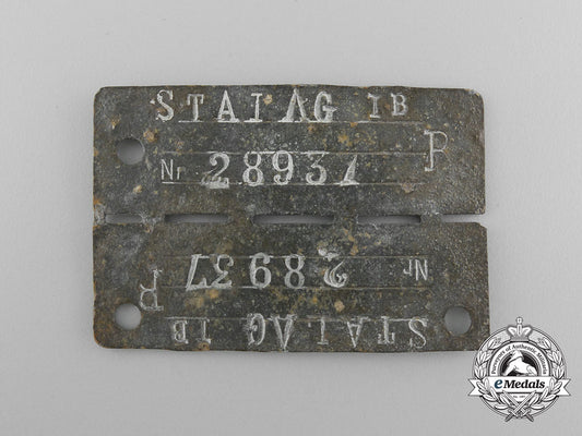 a_numbered_german_pow_camp_id_tag_for_allied_soldiers_housed_at_the_stalag_i-_b_hohenstein_camp_d_5981