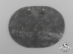 A First War German Id Disc Belonging To Diedrich Numsen