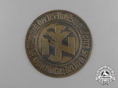 A District Cologne-Aachen National Socialist People’s Welfare Membership Badge