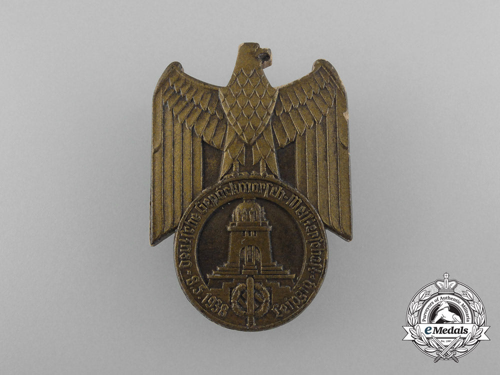 germany,_nsdap._a1938_leipzig_field-_dress_marching_rally_badge_by_e.o_friedrich_d_6336