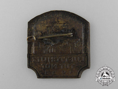 a1933_reichsluftschutzbund“_air_raid_protection_against_emergencies”_badge_d_6455_1
