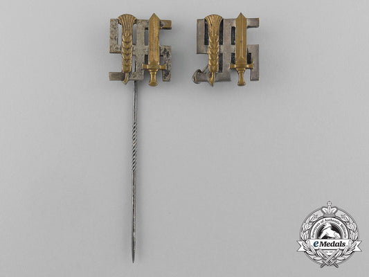 a_grouping_of_two_reichsnährstand_membership_stick_pins_and_badges_d_6603_1