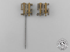 A Grouping Of Two Reichsnährstand Membership Stick Pins And Badges