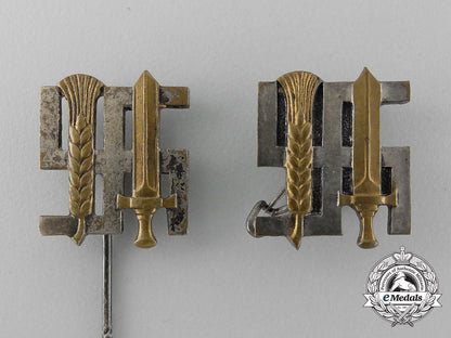 a_grouping_of_two_reichsnährstand_membership_stick_pins_and_badges_d_6604_1