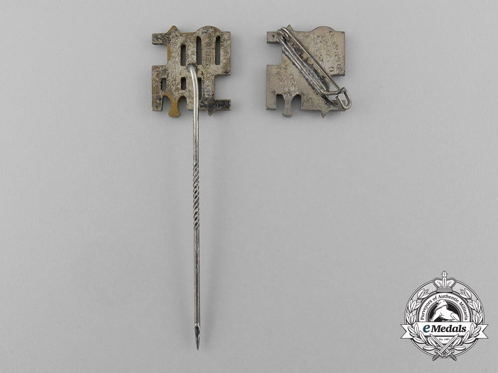 a_grouping_of_two_reichsnährstand_membership_stick_pins_and_badges_d_6606_1_1