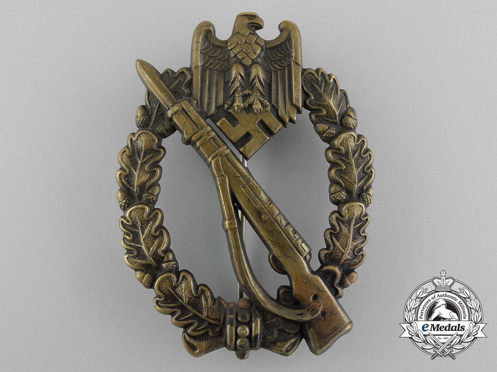 a_early_bronze_grade_infantry_assault_badge;_hollow_version_by_c._e._juncker_d_6999_1