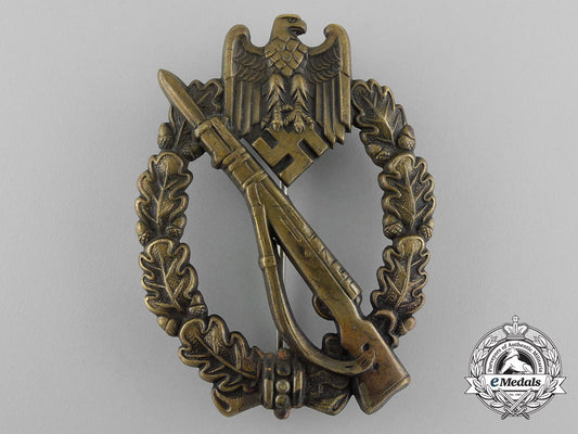 a_early_bronze_grade_infantry_assault_badge;_hollow_version_by_c._e._juncker_d_6999_1