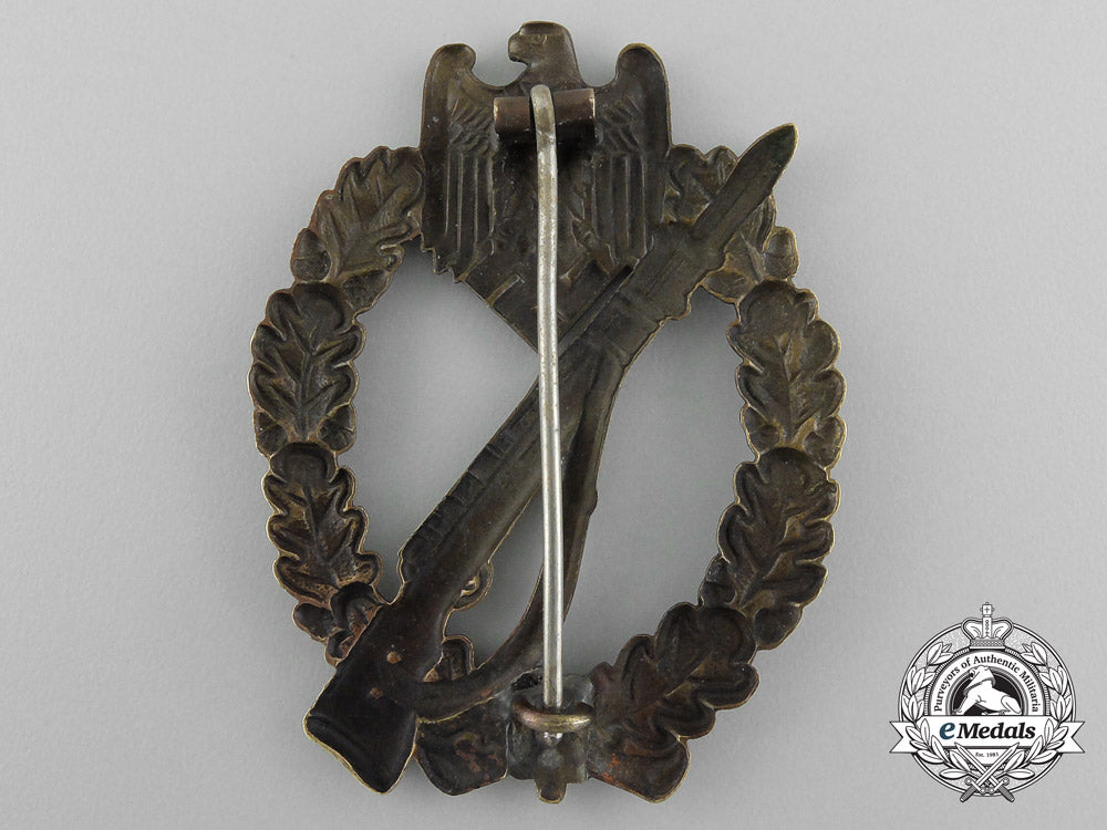 a_early_bronze_grade_infantry_assault_badge;_hollow_version_by_c._e._juncker_d_7000_1