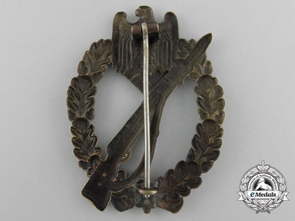 a_early_bronze_grade_infantry_assault_badge;_hollow_version_by_c._e._juncker_d_7000_1