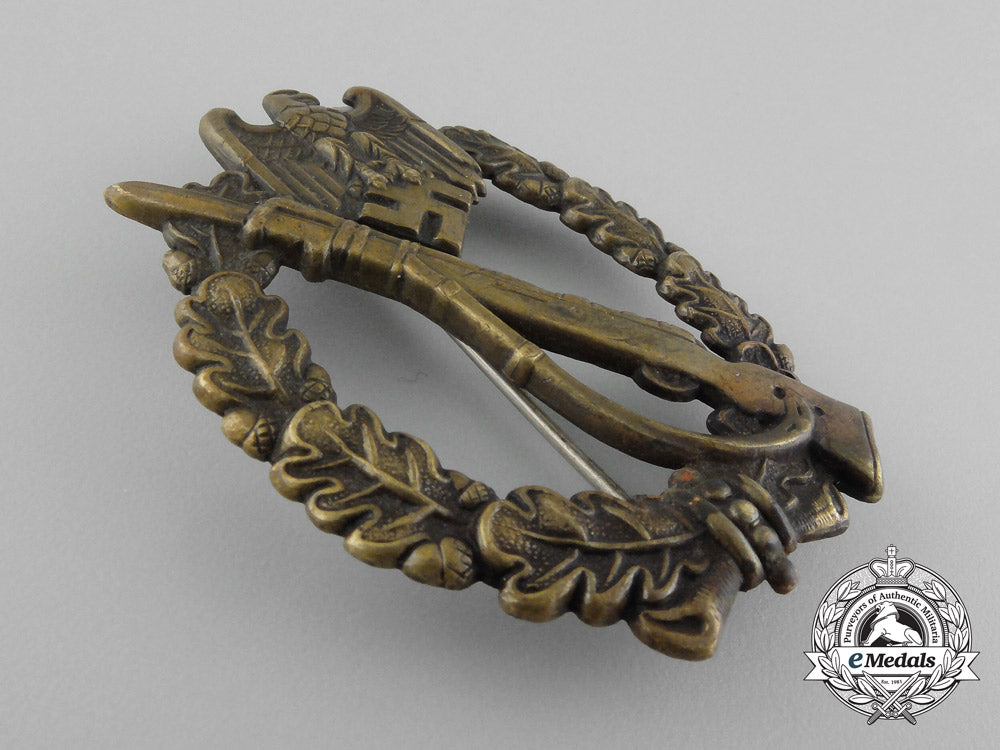 a_early_bronze_grade_infantry_assault_badge;_hollow_version_by_c._e._juncker_d_7001_1