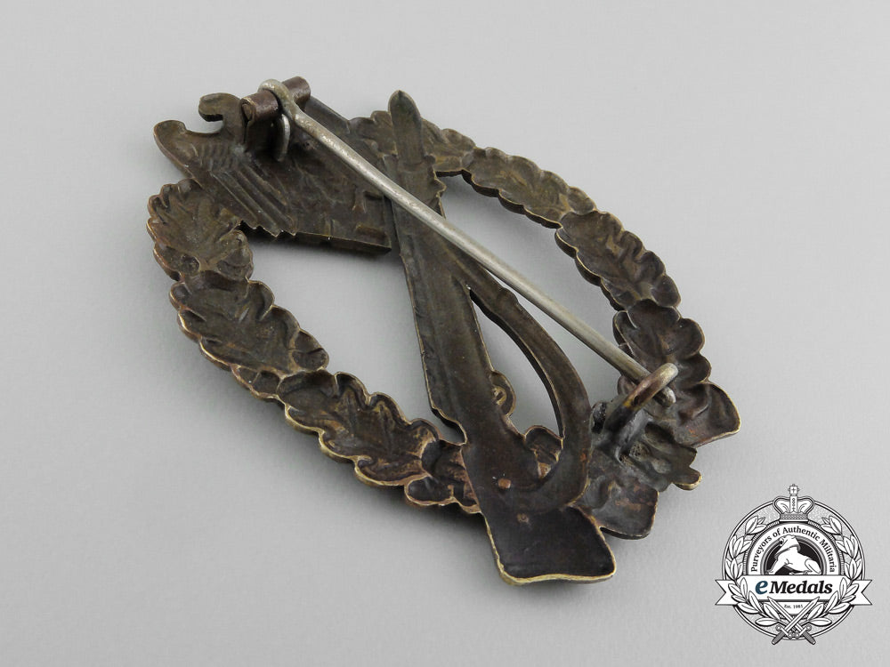 a_early_bronze_grade_infantry_assault_badge;_hollow_version_by_c._e._juncker_d_7002_1