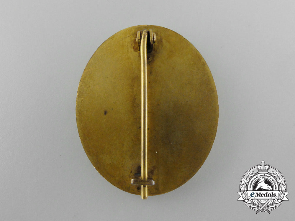 a_gold_grade_wound_badge_by"_hauptmnzamt_wien";_in_case_of_issue_d_7175