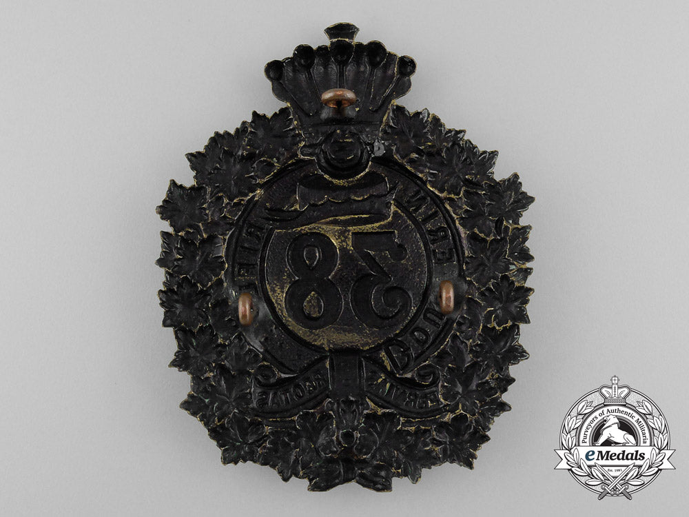 a_victorian38_th_brant_battalion(_dufferin_rifles)_helmet_plate,1879_design_d_7241_1