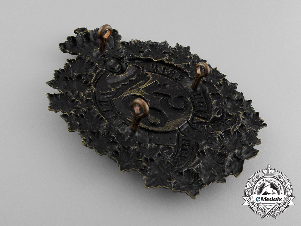 a_victorian38_th_brant_battalion(_dufferin_rifles)_helmet_plate,1879_design_d_7242_1