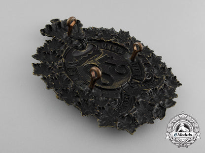 a_victorian38_th_brant_battalion(_dufferin_rifles)_helmet_plate,1879_design_d_7242_1