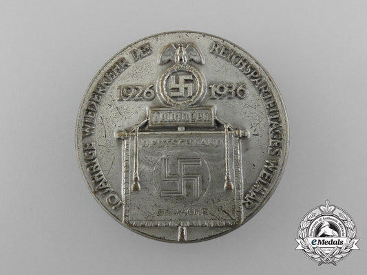 a1936“10_year_anniversary_of_the_return_of_the_reichsparteitag_weimar”_badge_by_h._wernstein_d_7306