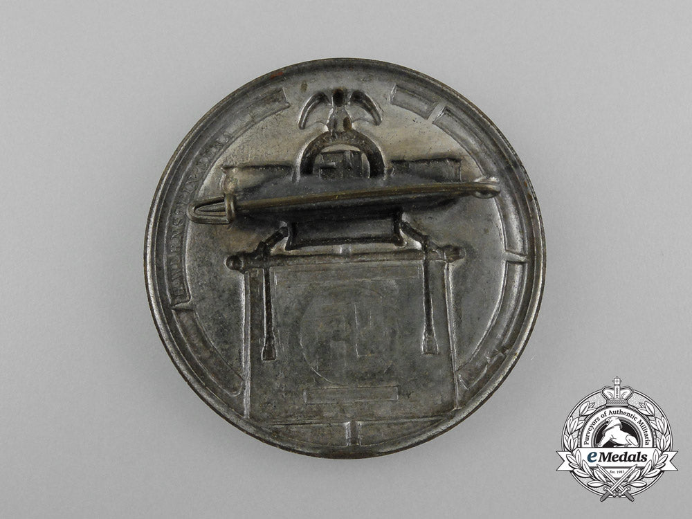a1936“10_year_anniversary_of_the_return_of_the_reichsparteitag_weimar”_badge_by_h._wernstein_d_7307