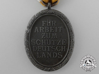 a_west-_wall_medal_with_packet_of_issue_d_7423