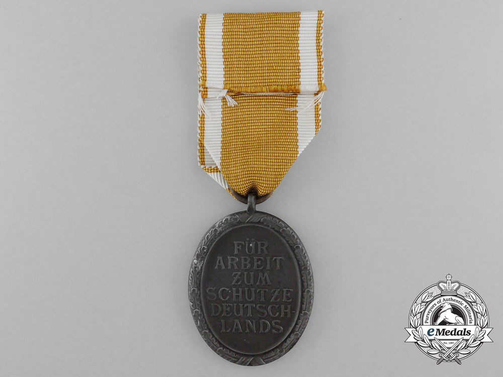 a_west-_wall_medal_with_packet_of_issue_d_7424