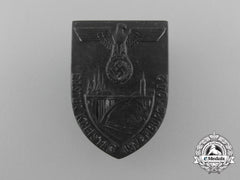 A 1942 “First District Council Day Of Luxemburg” Badge