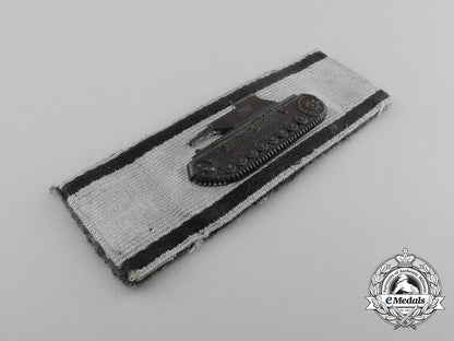 a_fine_badge_for_single-_handed_tank_destruction;_silver_grade_d_7482_1