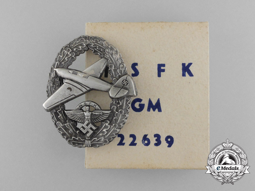a_scarce_nsfk_motor_pilot_badge;_ii_type_in_its_original_carton_of_issue;_matching_numbers_d_7483_1