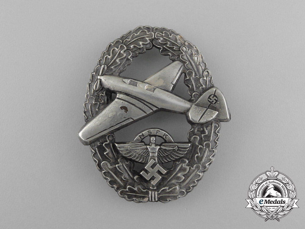 a_scarce_nsfk_motor_pilot_badge;_ii_type_in_its_original_carton_of_issue;_matching_numbers_d_7486_1