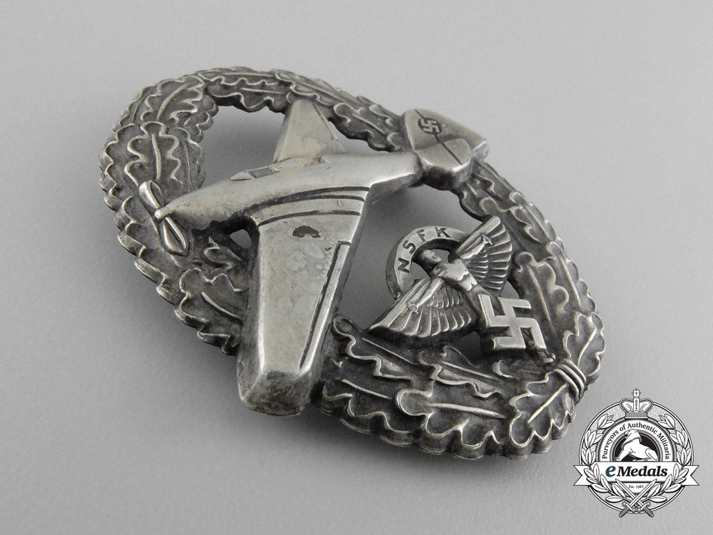 a_scarce_nsfk_motor_pilot_badge;_ii_type_in_its_original_carton_of_issue;_matching_numbers_d_7488_1